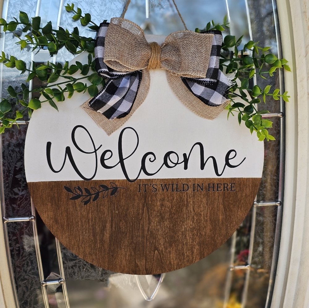 Welcome it's wild in here sign